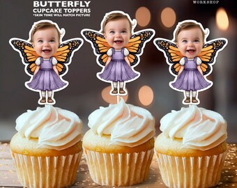 May include: Three cupcakes topped with butterfly-themed cupcake toppers. The toppers feature a smiling child with butterfly wings and a purple dress. The cupcakes are on a wooden surface. Text on the image reads "Personalized BUTTERFLY CUPCAKE TOPPERS".