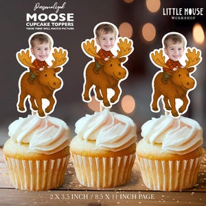 May include: Personalised moose cupcake toppers featuring a child's face on each. The toppers are 2 x 3.5 inches and are printed on an 8.5 x 11 inch page. The text "Personalized Moose Cupcake Toppers" and "Little Mouse Workshop" is included in the image.