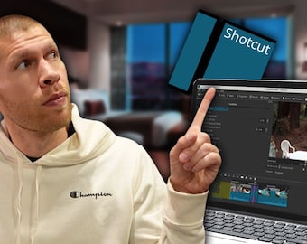Peut inclure: Une personne pointe du doigt l'écran d'un ordinateur portable affichant le logiciel de montage vidéo "Shotcut". L'interface du logiciel est visible, avec une chronologie vidéo et une fenêtre d'aperçu montrant une scène de paysage.