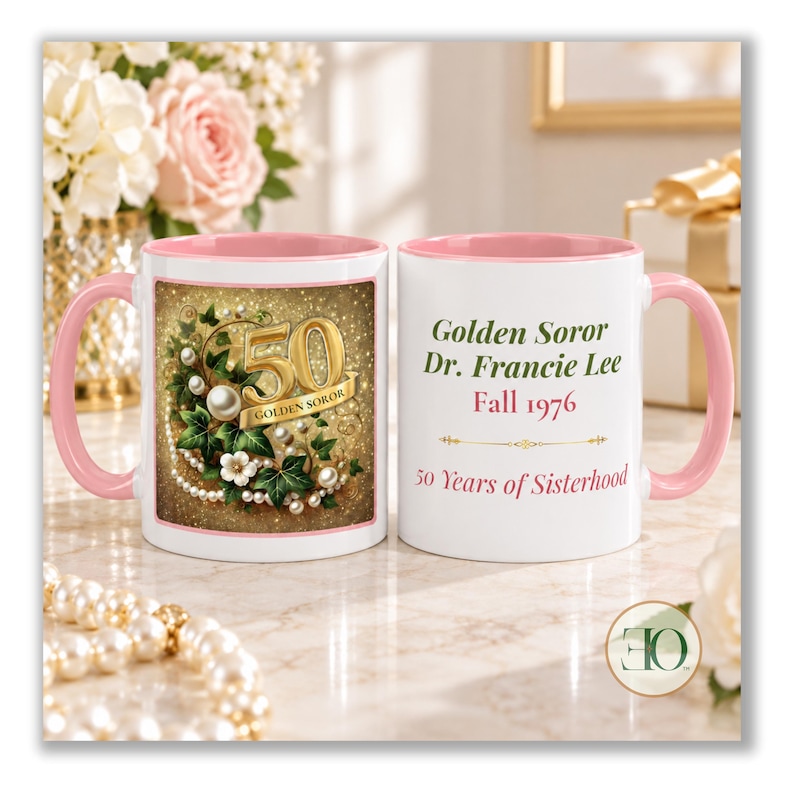 May include: Two white ceramic mugs with pink handles and rims. One mug features a gold 50, pearls, and ivy leaves. The other mug displays the text: Golden Soror, Dr. Francie Lee, Fall 1976, and 50 Years of Sisterhood in green and pink lettering.