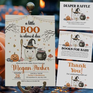 May include: Halloween-themed baby shower invitations and inserts. The main invitation features a ghost wearing a witch hat, with the text "a little BOO is almost due." Additional cards include "Diaper Raffle," "Books for Baby," and "Thank You!"