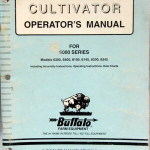 May include: A blue and white operator's manual for the Buffalo 6000 series cultivator. The manual includes assembly instructions, operating instructions, and rate charts. The manual is for models 6300, 6400, 6100, 6140, 6200, and 6240.