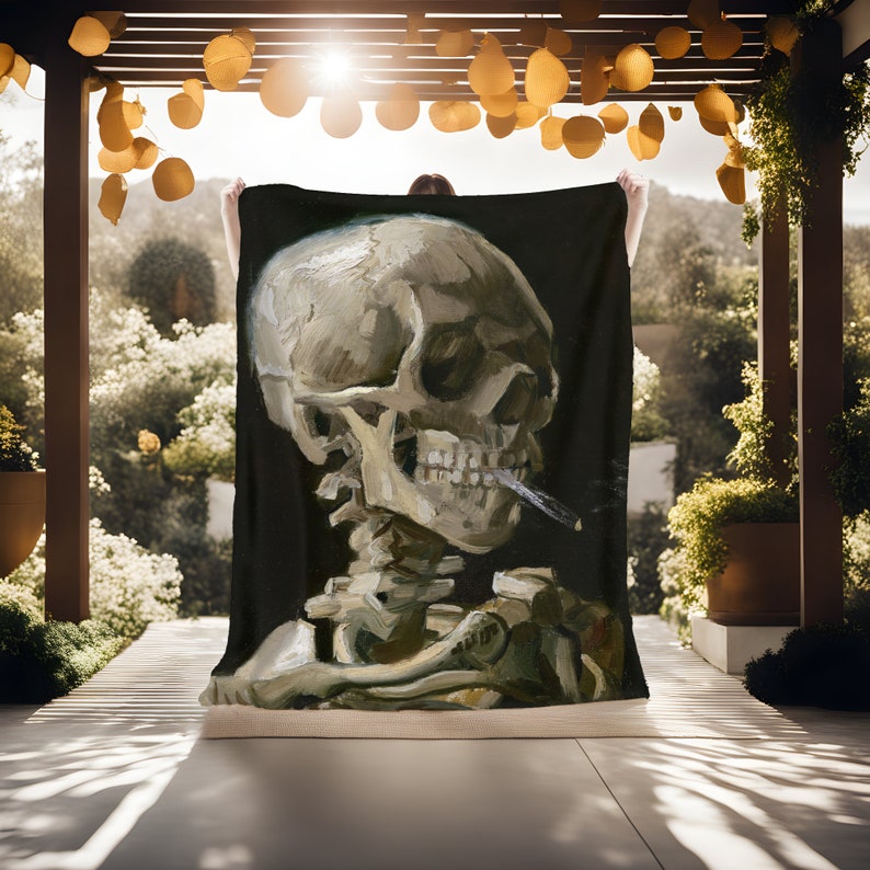 May include: A black and white painting of a human skull with a cigarette in its mouth. The skull is depicted in a realistic style, with visible teeth and bone structure. The painting is set against a dark background.