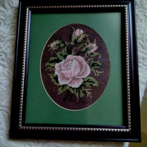 Tapestry wall art combining vintage handcraft with 30 years of home decor: Timeless elegance with a nostalgic touch.