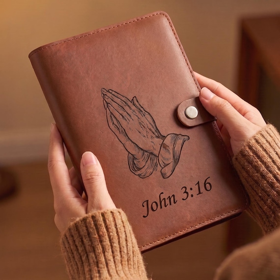 Refillable A5 leather journal cover with custom monogram engraving — the refillable format elevates it from a one-use gift to a lasting everyday object.