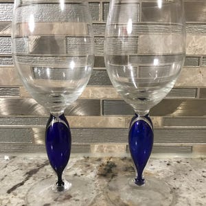 Two Clear Hand Made Glass With Cobalt Blue Stem Wine Cup Set Of Two (8 Inches H’)