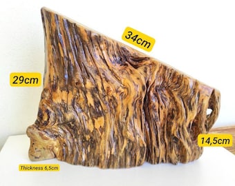 May include: A decorative wooden sculpture with a natural, textured surface. The piece is approximately 13.4 inches long, 11.4 inches high, 5.7 inches thick, and 5.7 inches wide. The wood grain features shades of brown and gold.