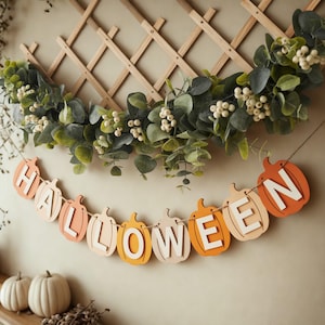 Ghirlanda di zucche di Halloween: decorazione per feste autunnali