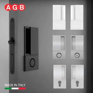 May include: A black door handle with a lever and a push button. The handle is mounted on a grey door. The image also shows different styles of door handles in white, silver, and black.
