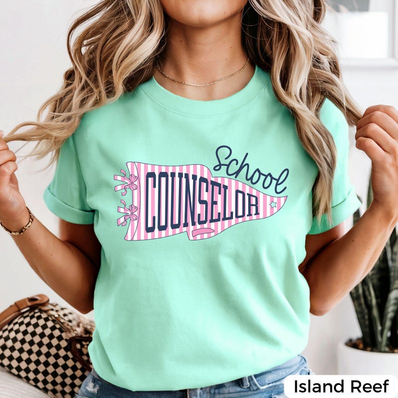 school counselor shirt featuring a retro striped pennant graphic with counselor lettering, designed for guidance counselors, school psychologists, and student support professionals.