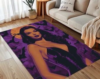 May include: A rectangular area rug featuring a woman with long dark hair, a black dress, and a purple background with bats and a full moon. The rug is placed on a wooden floor.