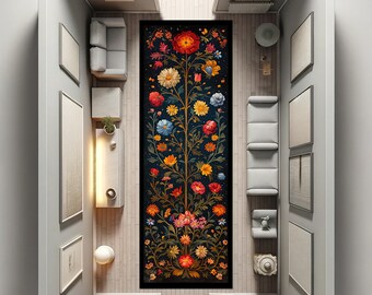 May include: A long, narrow rug with a dark blue background and a colorful floral design. The rug features a central tree with branches reaching up and out, adorned with flowers in shades of red, orange, yellow, pink, and blue. The flowers are surrounded by leaves and vines, creating a lush and vibrant pattern.