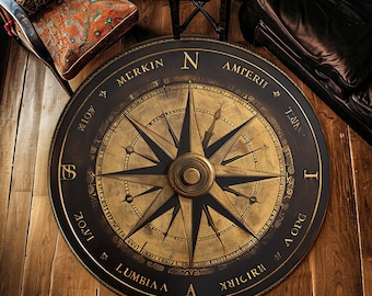 May include: A black and gold compass with the words "Merkin Amteri" and "Lumbia A" around the edge. The compass is on a wooden surface.