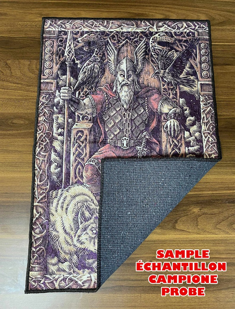 May include: A decorative rug featuring a detailed illustration of a Viking warrior seated on a throne, surrounded by ravens and wolves. The rug has a dark brown background with intricate patterns and a black border. The text "SAMPLE &Eacute;CHANTILLON CAMPIONE PROBE" is printed on the bottom right corner of the rug.
