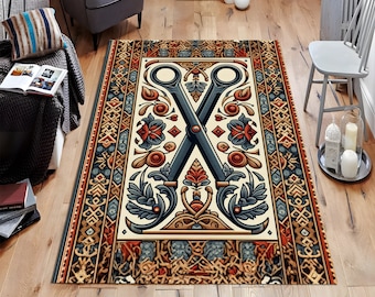 May include: A beige rug with a brown, red, and blue floral pattern. The center of the rug features a pair of crossed scissors with ornate details.