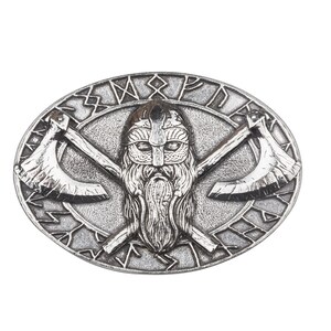 May include: Silver-toned belt buckle with a Viking warrior design. The buckle features a bearded warrior's head with crossed axes and a circular inscription around the edge.