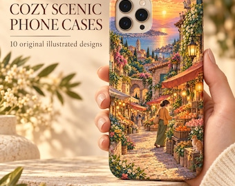 May include: A phone case featuring a vibrant illustration of a Mediterranean-style street market at sunset, with stone buildings, colorful flowers, fruit stalls, and a cat. The text reads COZY SCENIC PHONE CASES and 10 original illustrated designs.