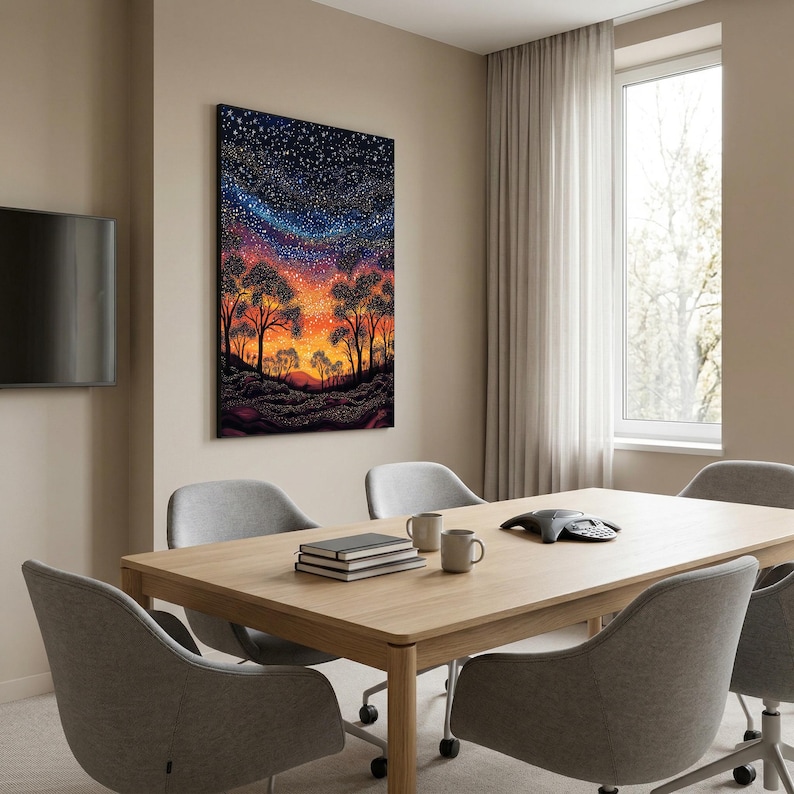 May include: A rectangular wall art print featuring a vibrant landscape at twilight. The scene depicts silhouetted trees against a gradient sky transitioning from deep blue with white stars to a bright orange and yellow horizon above dark terrain.