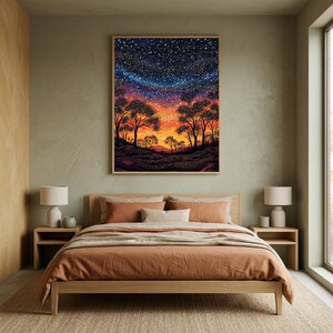 May include: A rectangular wall art print featuring a vibrant night sky filled with countless white stars above a silhouette of trees. The horizon glows with warm orange and yellow hues, transitioning into deep blues and purples at the top.