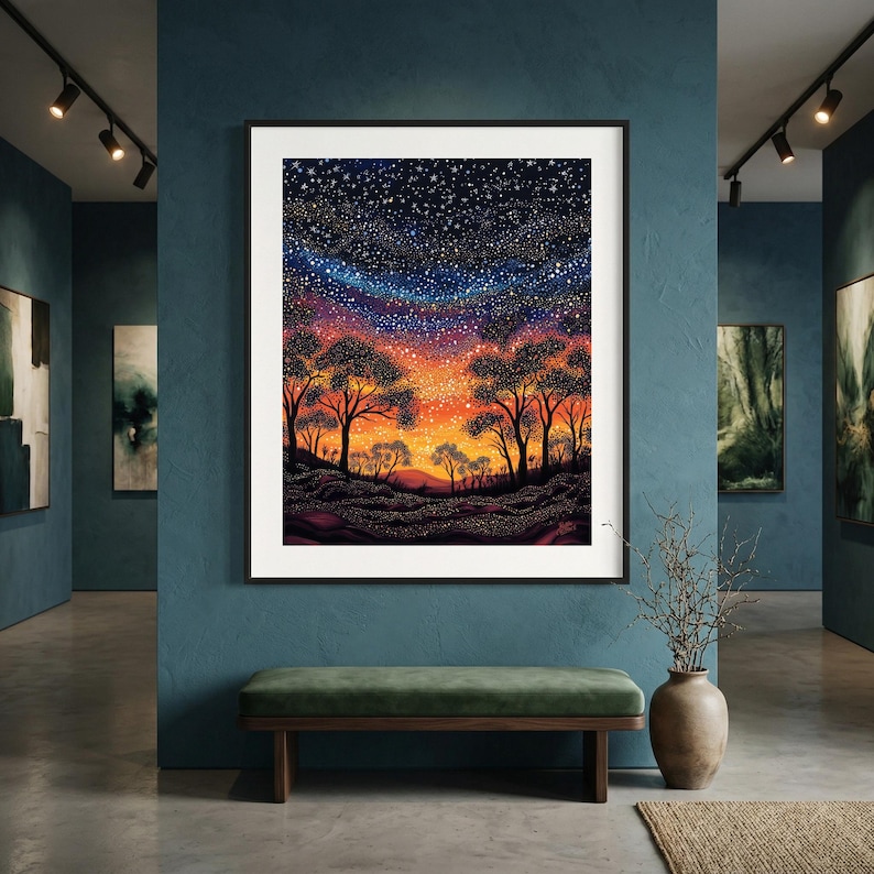 May include: A framed wall art print featuring a vibrant landscape at twilight. The scene depicts silhouettes of trees against a gradient sky transitioning from deep orange and yellow at the horizon to a dark blue starry night sky filled with white dots.