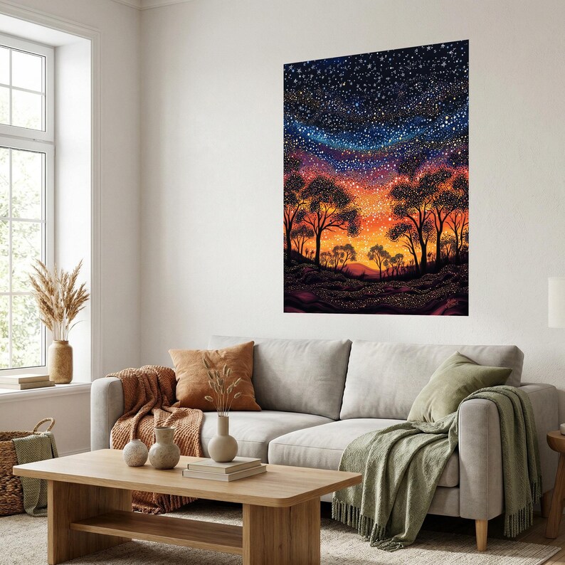 May include: A large rectangular wall art print featuring a vibrant night sky filled with countless white stars above a silhouetted landscape of trees. The horizon glows with warm orange and yellow hues, transitioning into deep purple and blue tones.