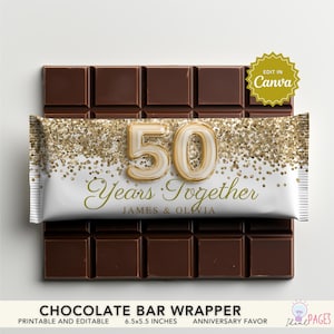 May include: A chocolate bar with a custom wrapper for a 50th anniversary. The wrapper is white with gold glitter and the text "50 Years Together" with the names James & Olivia. The bar is 6.5 x 5.5 inches.