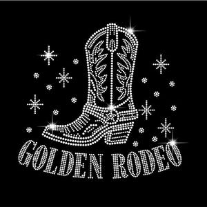 May include: A rhinestone design on a black background features a cowboy boot and the words "GOLDEN RODEO". The boot is white and detailed with sparkling accents. Surrounding the boot are several star-shaped embellishments.