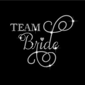 May include: Team Bride text in silver glitter with a small heart in the middle of the word Bride.
