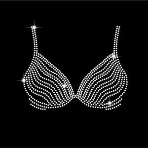 May include: A white rhinestone bra design on a black backdrop. The bra is made up of many small, sparkling white rhinestones arranged in a bra shape. The design includes straps and cups, with a shimmering effect.