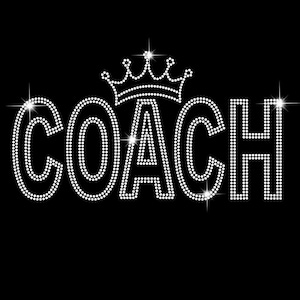 Può includere: Un design in strass della parola "COACH" con una corona in strass sopra.