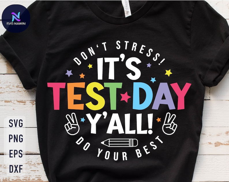 May include: Black t-shirt with a rainbow colored graphic that says "Don't Stress! It's Test Day Y'all! Do Your Best".