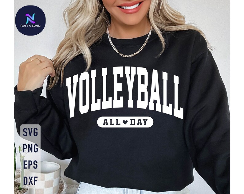 Puede incluir: Sudadera negra con texto blanco que dice "Volleyball All Day" con un s&iacute;mbolo de coraz&oacute;n entre las palabras "All" y "Day".