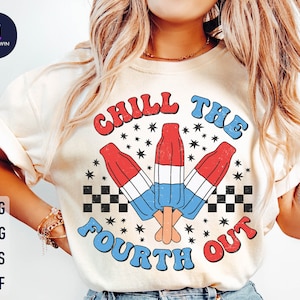 May include: A white t-shirt with a graphic design of three red, white, and blue popsicles with the text "Chill the Fourth Out" in a retro font.