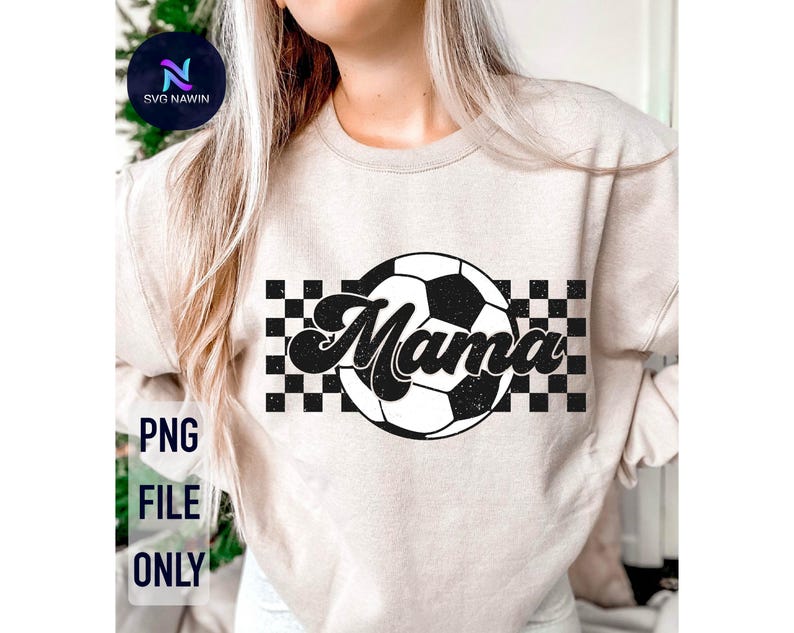 May include: A white sweatshirt with a black and white checkered pattern and a soccer ball with the word "Mama" in a retro font.