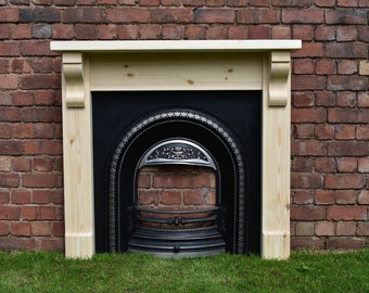 Pine fire surround with a 45mm chunky top. Made to measure at an extra cost.