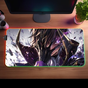 May include: A black and purple anime-style mousepad with a character with purple eyes and black hair. The character is wearing a black and gold outfit. The mousepad has a rainbow-colored border.