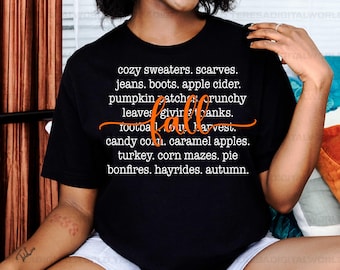 Pode incluir: Camiseta preta com o texto "cozy sweaters. scarves. jeans. boots. apple cider. pumpkin patch crunchy leaves giving thanks. football fall harvest. candy corn. caramel apples. turkey. corn mazes. pie bonfires. hayrides. autumn."