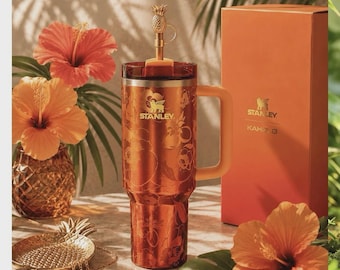 The Stanley 1913 x KAROL G 40 oz Quencher H2.O FlowState Tumbler