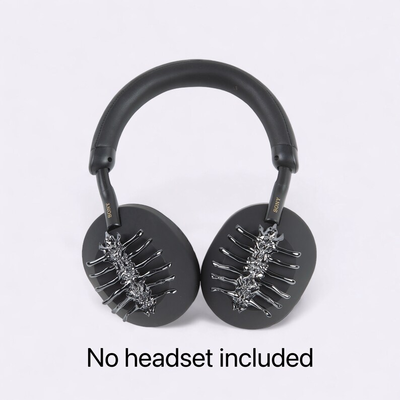 May include: Black over-ear headphones with a black headband and silver accents. The headphones have the word "SONY" written on the side. "No headset included" is written in black text on a white background below the headphones.