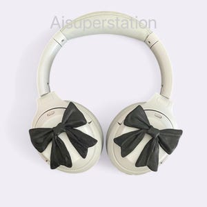 Pinke Schleife Kopfhörer Aufsätze: Sony XM4, XM5, AirPods Max Schwarz