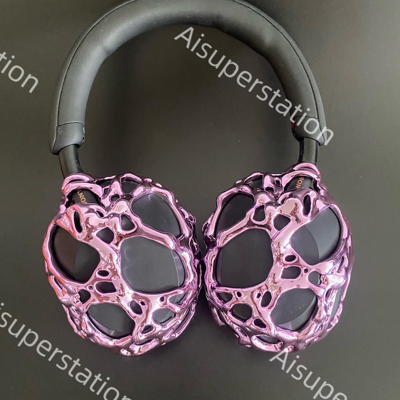 May include: Purple headphones with a unique, textured design. The headphones have a black headband and earcups.