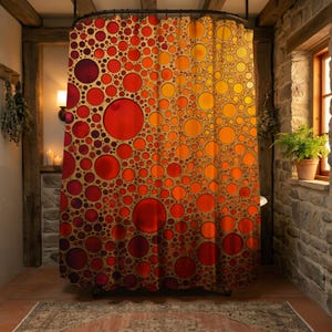 May include: A vibrant shower curtain featuring a pattern of overlapping circles in shades of red, orange, and yellow. The design creates a gradient effect, transitioning from deep red to a bright yellow. The curtain is hanging in a rustic bathroom setting.
