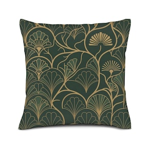 May include: A square throw cushion featuring a dark forest green background with a repeating gold line pattern of stylised fan-shaped leaves and interconnected stems. The design covers the entire front surface of the cushion in a symmetrical layout.