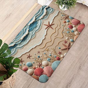 May include: A rectangular doormat with a beach scene design. The mat features a sandy beach with seashells, starfish, and ocean waves in shades of blue, beige, and coral. The mat is made of a durable material.