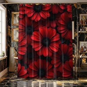 May include: A red floral shower curtain with a black background. The curtain features a repeating pattern of large, vibrant red flowers with black centers. The bathroom has black and gold marble tile.