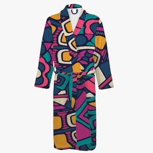 May include: A colorful patterned robe with a geometric design in shades of pink, yellow, blue, and green. The robe has a tie belt and two pockets.