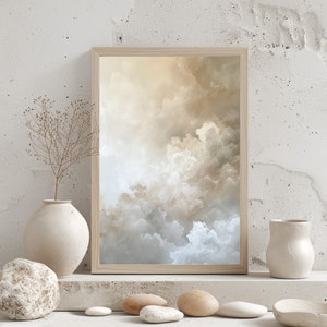Peut inclure: Une impression encadr&eacute;e d'un ciel nuageux dans des tons beige et bleu, expos&eacute;e sur une &eacute;tag&egrave;re blanche avec des pierres d&eacute;coratives et des vases.