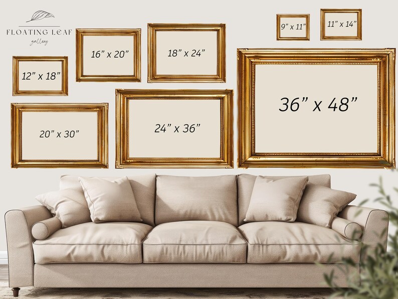 May include: A white wall with a variety of gold picture frames of different sizes. The frames are arranged in a staggered pattern. The frames are labeled with their dimensions in inches. The frames are hanging above a white couch.