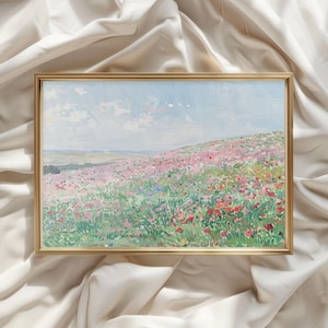 May include: A framed painting of a field of pink and red wildflowers with a blue sky and white clouds in the background.