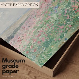 May include: A close-up of a framed print of a painting depicting a field of pink flowers. The print is on museum-grade paper and is framed in a dark wood frame. The text "MATTE PAPER OPTION" is visible at the top of the image. The text "Museum grade paper" is visible at the bottom of the image.